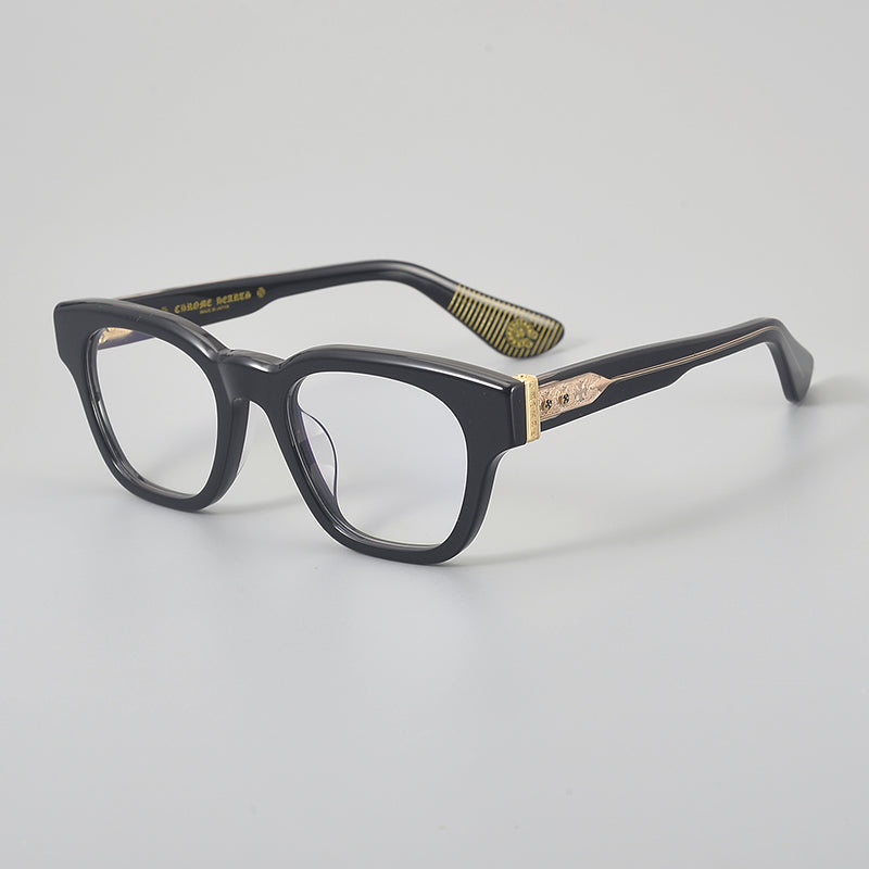 
Monturas de gafas rectangulares de acetato y titanio con esquinas redondeadas y detalles estampados en las varillas - Negro y dorado