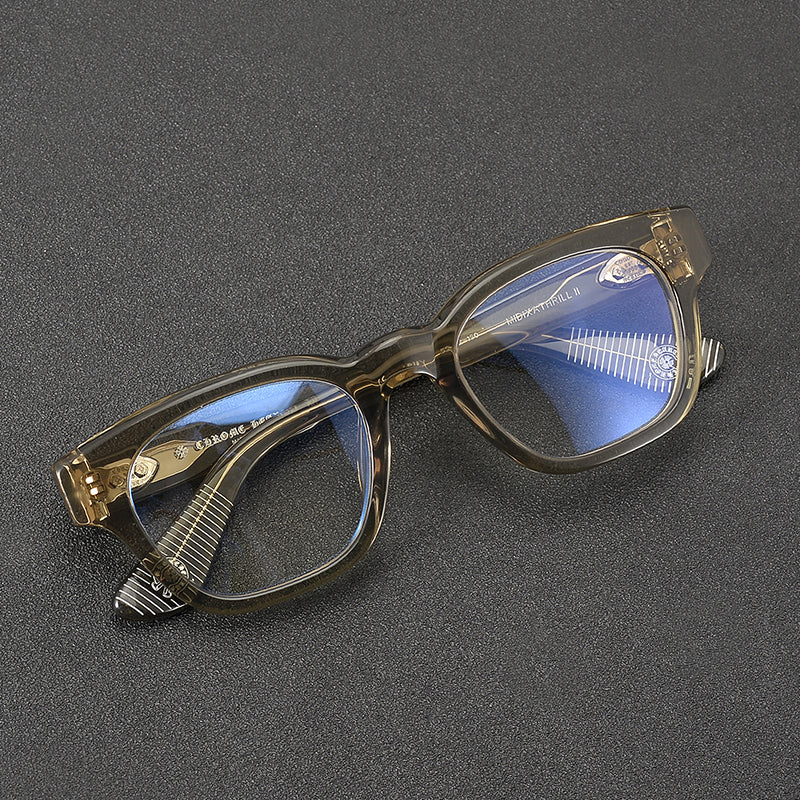 
Monturas de gafas rectangulares de acetato y titanio con esquinas redondeadas y detalles estampados en las varillas - Imagen 3