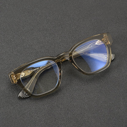 
Monturas de gafas rectangulares de acetato y titanio con esquinas redondeadas y detalles estampados en las varillas - Imagen 3