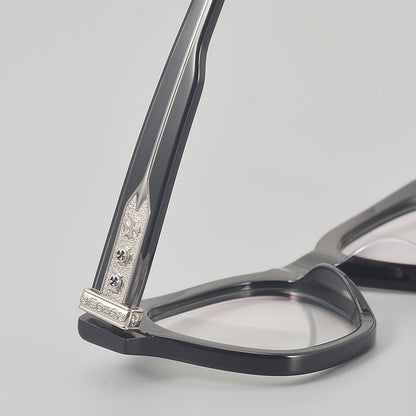 
Monturas de gafas rectangulares de acetato y titanio con esquinas redondeadas y detalles estampados en las varillas - Imagen 5