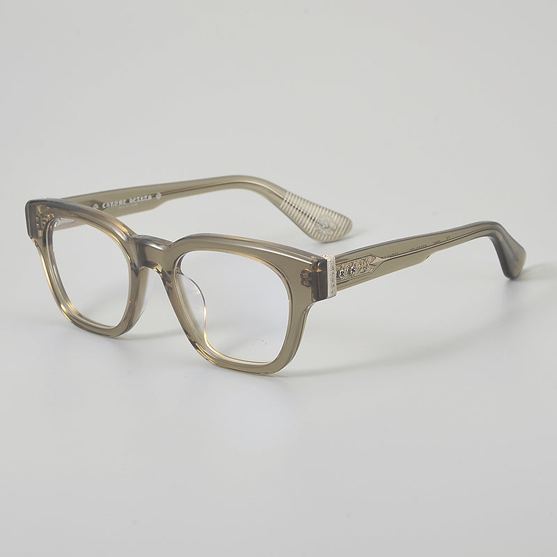 
Monturas de gafas rectangulares de acetato y titanio con esquinas redondeadas y detalles estampados en las varillas - Marrón translúcido