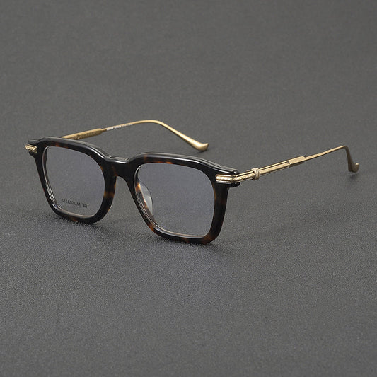 Monturas de gafas rectangulares retro con línea superior definida y patillas de metal delgadas