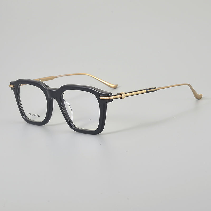 
Monturas de gafas rectangulares retro con línea superior definida y patillas de metal delgadas