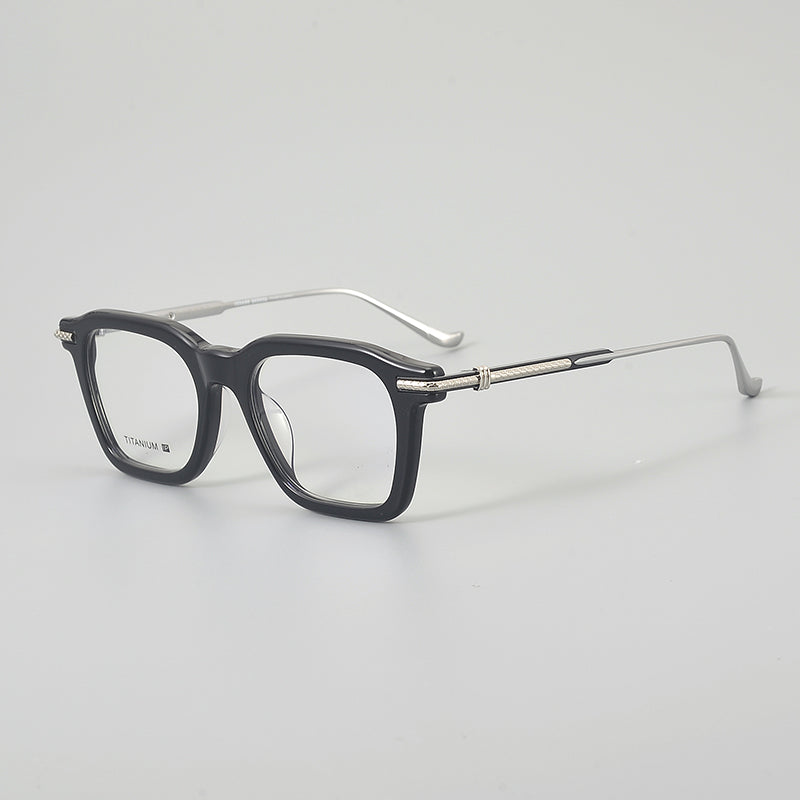 
Monturas de gafas rectangulares retro con línea superior definida y patillas de metal delgadas