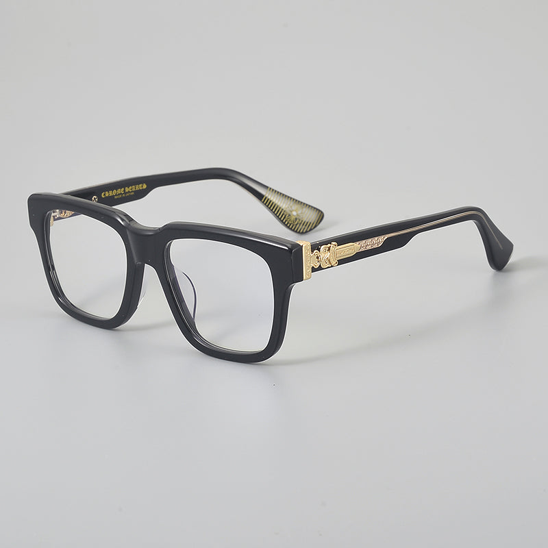 
Monturas de gafas rectangulares de acetato con aros completos esculpidos y paneles decorativos en las varillas - Negro y dorado