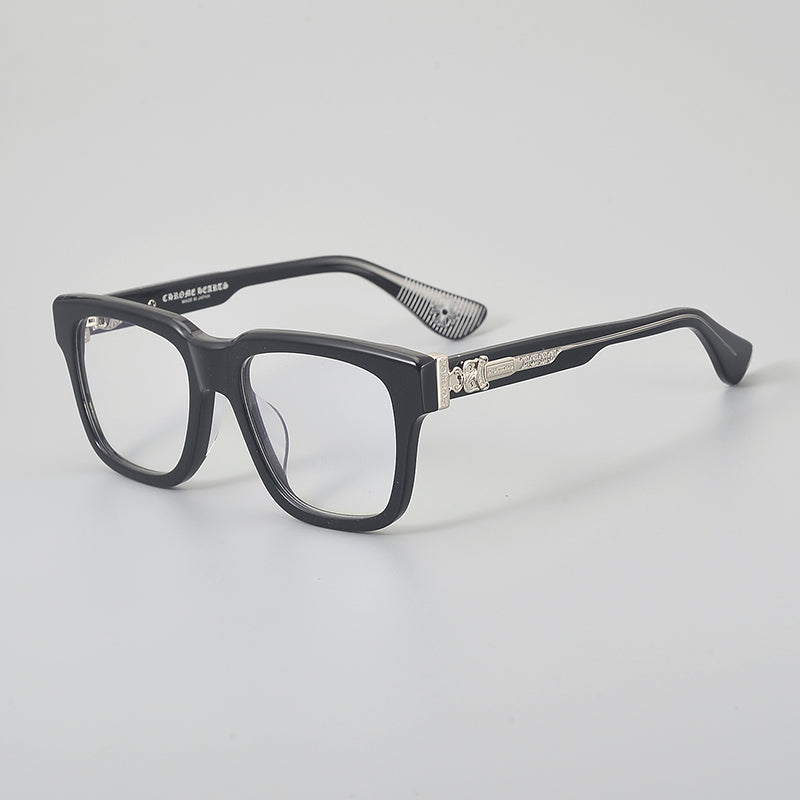 
Monturas de gafas rectangulares de acetato con aros completos esculpidos y paneles decorativos en las varillas