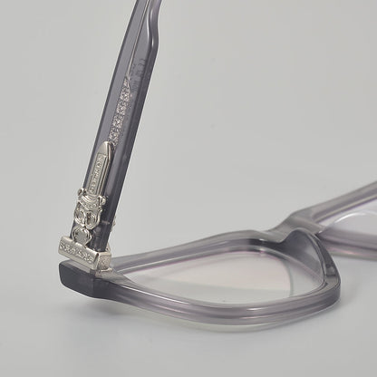 
Monturas de gafas rectangulares de acetato con aros completos esculpidos y paneles decorativos en las varillas - Imagen 5