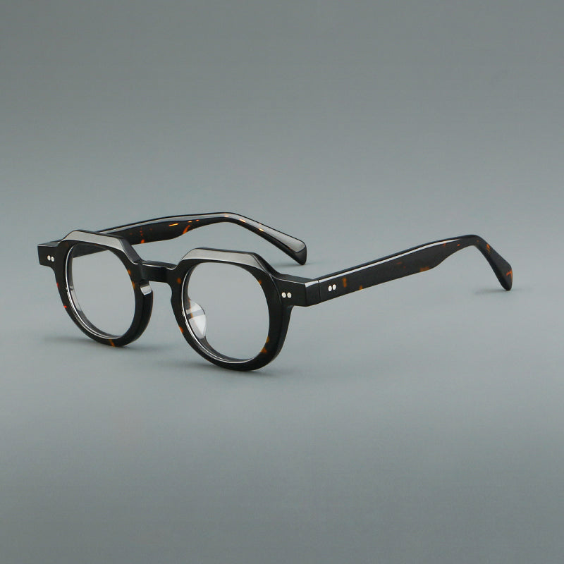 
Monturas de gafas vintage redondas de acetato, puente de cerradura profundo y detalles de remaches sutiles