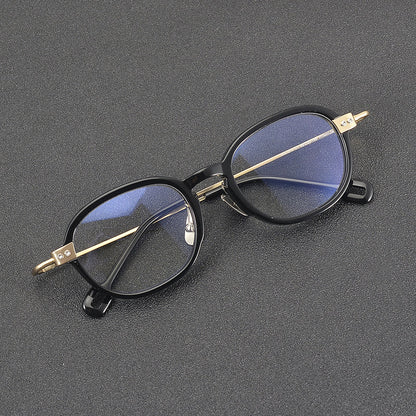 
Monturas de gafas redondas retro de aleación de titanio con línea de cejas curva y detalles laterales de metal - Imagen 2