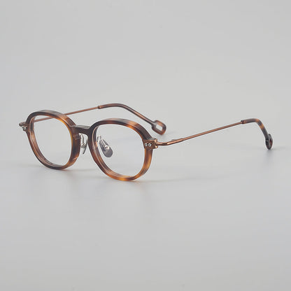 
Monturas de gafas redondas retro de aleación de titanio con línea de cejas curva y detalles laterales de metal - Imagen 4