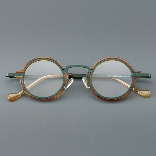 Monturas de gafas redondas de acetato hechas a mano con bordes circulares superpuestos y puente esculpido