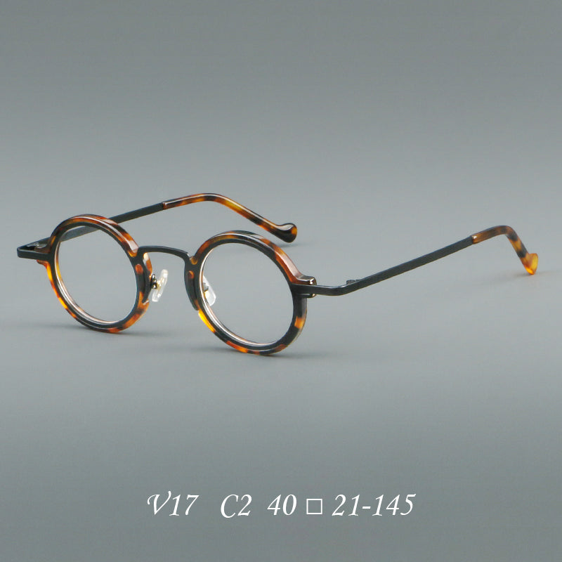 
Monturas de gafas redondas de acetato hechas a mano con bordes circulares superpuestos y puente esculpido