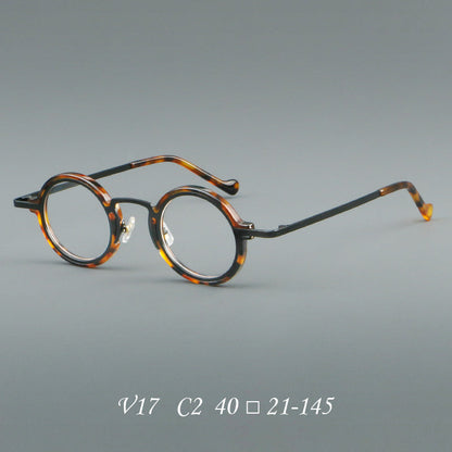 
Monturas de gafas redondas de acetato hechas a mano con bordes circulares superpuestos y puente esculpido