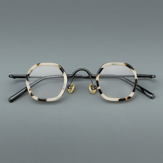 Monturas de gafas redondas geométricas vintage con puente arqueado elevado y almohadillas nasales