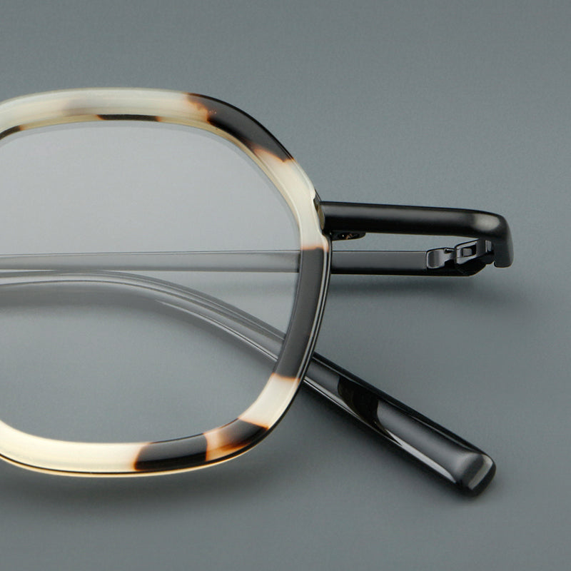 
Monturas de gafas redondas geométricas vintage con puente arqueado elevado y almohadillas nasales