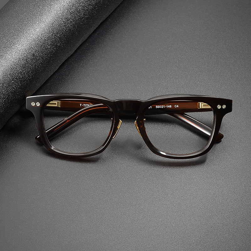 
Monturas de gafas clásicas cuadradas de acetato con detalle de remaches en el frente y varillas anchas - Imagen 2