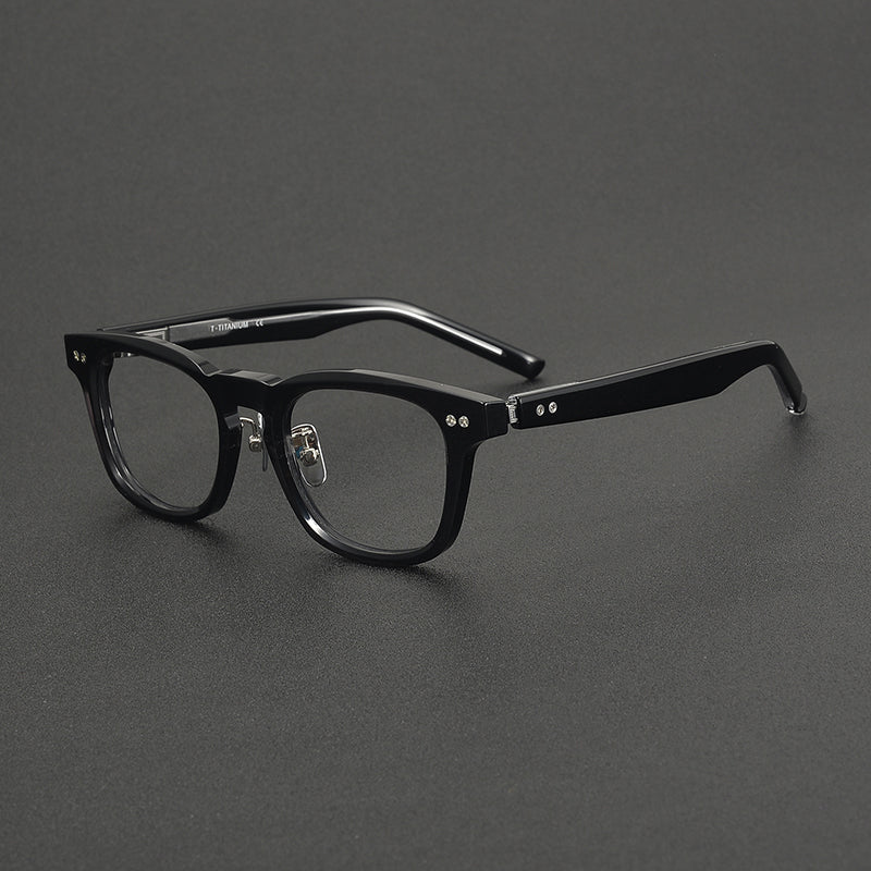 
Monturas de gafas clásicas cuadradas de acetato con detalle de remaches en el frente y varillas anchas