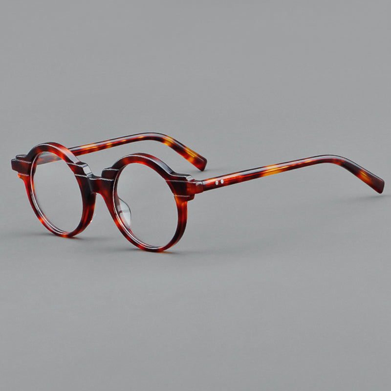 
Monturas de gafas redondas vintage de acetato con aros completos circulares y varillas contorneadas - Carey rojo