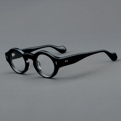 
Monturas de gafas retro redondas de acetato, bordes circulares gruesos y detalles laterales esculpidos