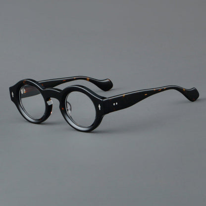 
Monturas de gafas retro redondas de acetato, bordes circulares gruesos y detalles laterales esculpidos - Imagen 3