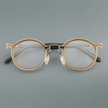 
Monturas de gafas redondas vintage con diseño de borde superpuesto y detalle de puente metálico - Imagen 4