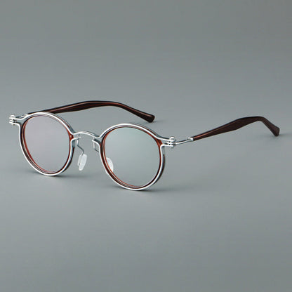 
Monturas de gafas redondas vintage con diseño de borde superpuesto y detalle de puente metálico - Imagen 5