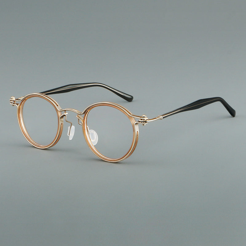 
Monturas de gafas redondas vintage con diseño de borde superpuesto y detalle de puente metálico - Champán y oro