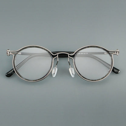 
Monturas de gafas redondas vintage con diseño de borde superpuesto y detalle de puente metálico - Imagen 8