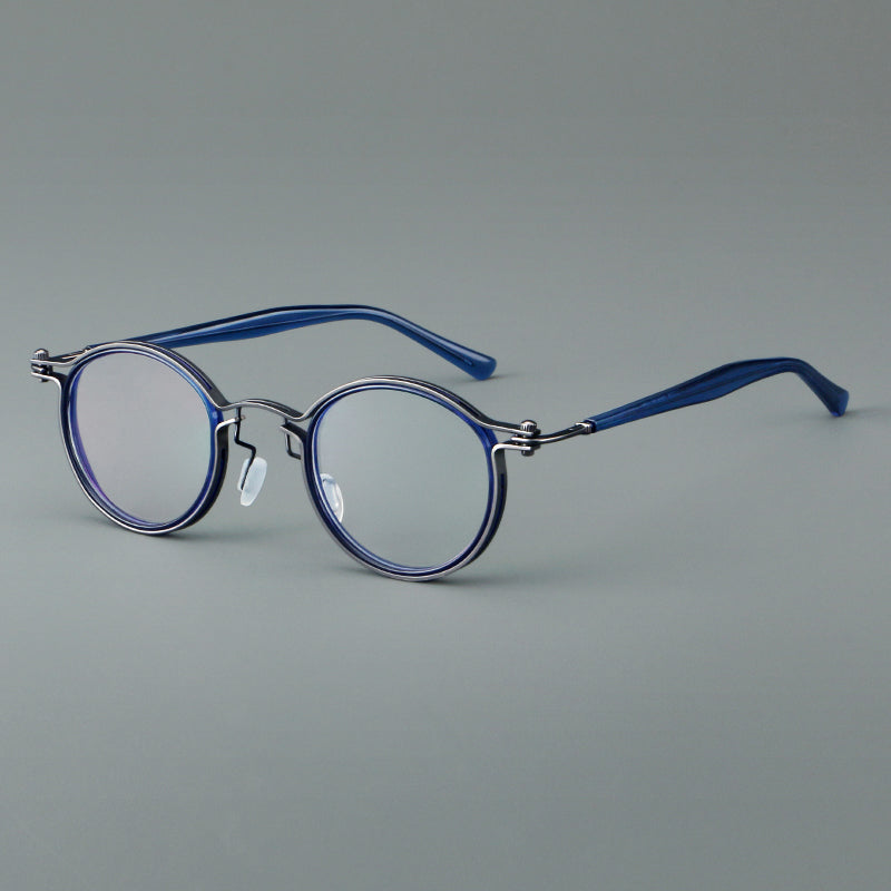 
Monturas de gafas redondas vintage con diseño de borde superpuesto y detalle de puente metálico - Azul y plateado