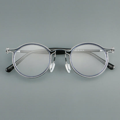 
Monturas de gafas redondas vintage con diseño de borde superpuesto y detalle de puente metálico - Imagen 12