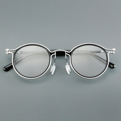 
Monturas de gafas redondas vintage con diseño de borde superpuesto y detalle de puente metálico - Imagen 14