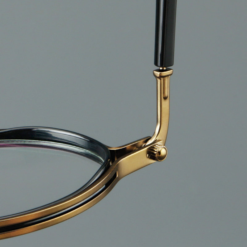 
Monturas de gafas redondas vintage con diseño de borde superpuesto y detalle de puente metálico - Imagen 16