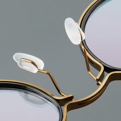 
Monturas de gafas redondas vintage con diseño de borde superpuesto y detalle de puente metálico - Imagen 17