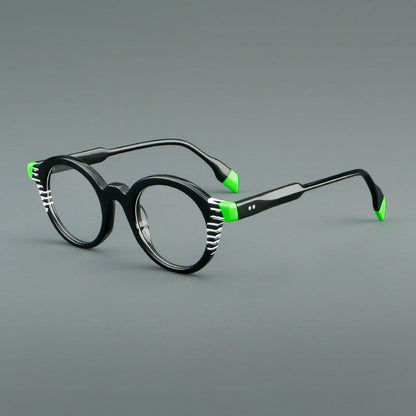 
Monturas de gafas redondas decorativas de acetato con detalles a rayas en las esquinas y varillas esculpidas - Imagen 7