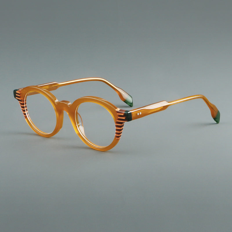 
Monturas de gafas redondas decorativas de acetato con detalles a rayas en las esquinas y varillas esculpidas