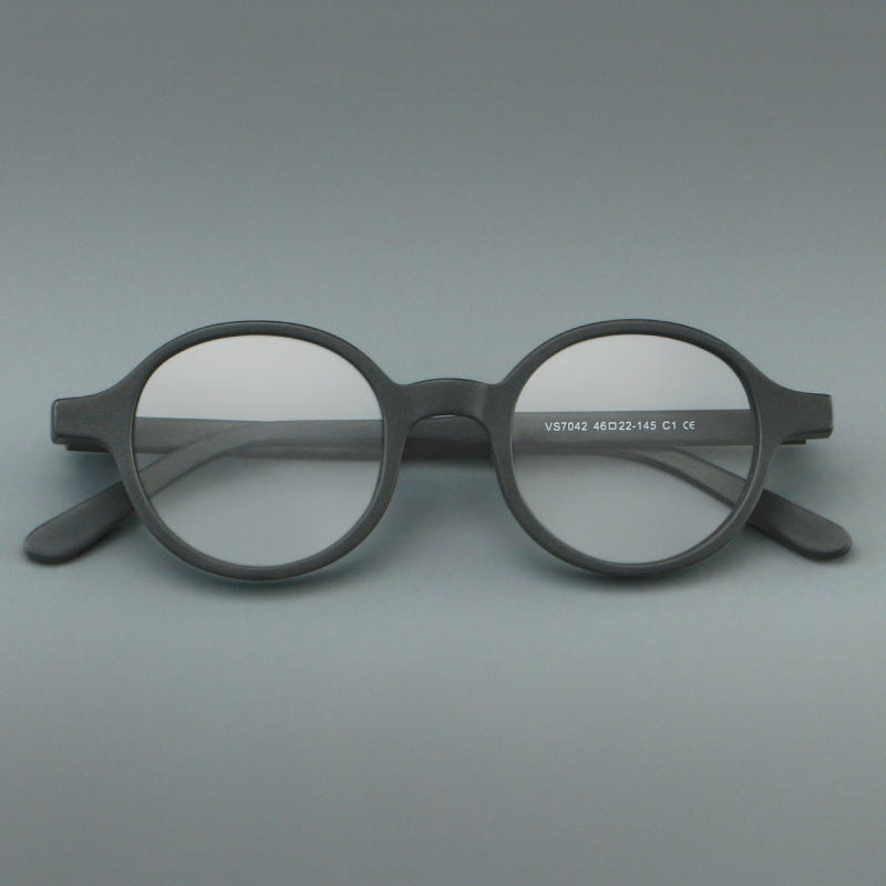 
Monturas de gafas redondas minimalistas de acetato, bordes completos lisos y líneas de patillas limpias