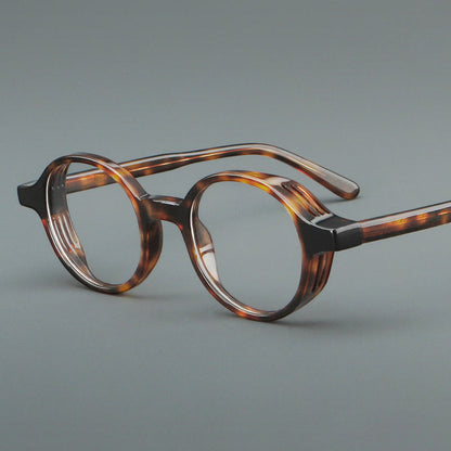 
Monturas de gafas redondas minimalistas de acetato, bordes completos lisos y líneas de patillas limpias - Imagen 4
