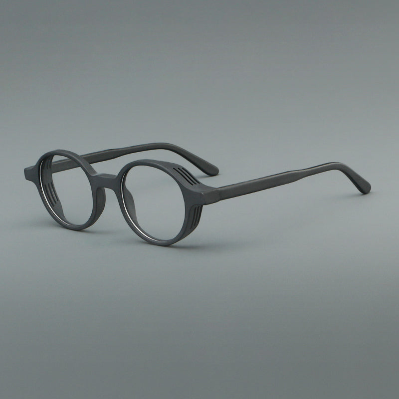 
Monturas de gafas redondas minimalistas de acetato, bordes completos lisos y líneas de patillas limpias