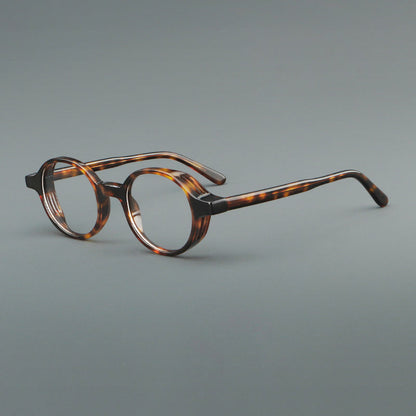 
Monturas de gafas redondas minimalistas de acetato, bordes completos lisos y líneas de patillas limpias - Imagen 7