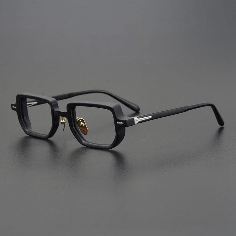 
Monturas de gafas rectangulares retro con aros completos esculpidos y detalles metálicos en las varillas