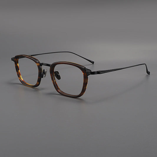 Monturas de gafas rectangulares de titanio con esquinas redondeadas y patillas de metal delgadas
