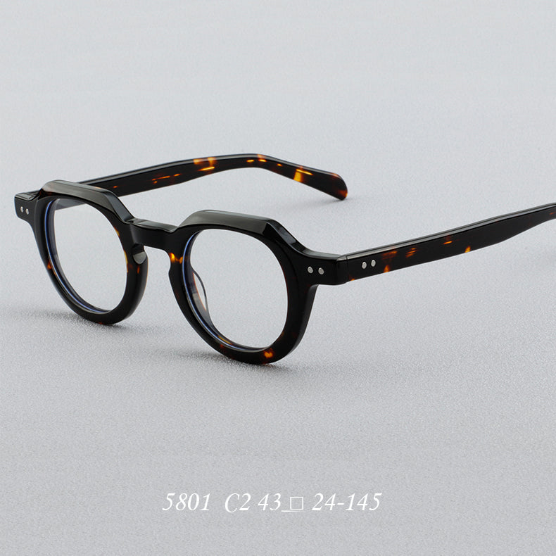 
Montura de gafas redondas vintage de acetato con puente de cerradura y detalles de remaches cuadrados