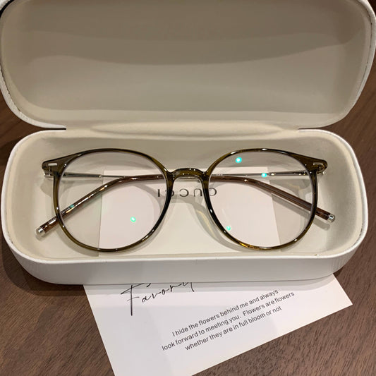 Monturas de gafas redondas con línea de cejas definida, color marrón té frío o marrón té oolong
