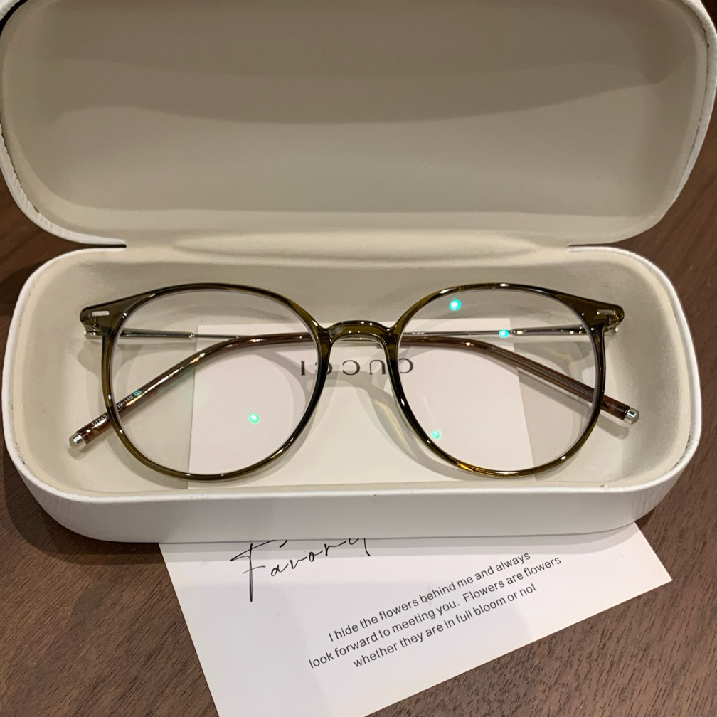 
Monturas de gafas redondas con línea de cejas definida, color marrón té frío o marrón té oolong