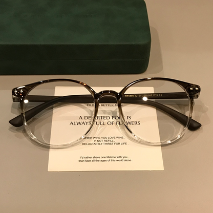 
Monturas de gafas ovaladas con construcción TR, marrón café degradado o negro
