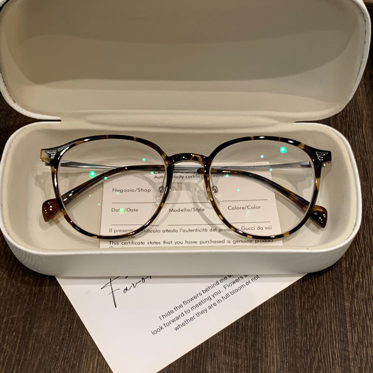 
Monturas de gafas redondas con aros y varillas delgados, carey, negro o transparente