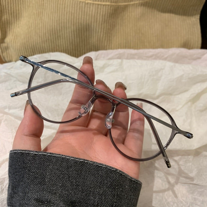 
Monturas de gafas redondas con a ros finos, gris transparente o marrón té frío - Imagen 7