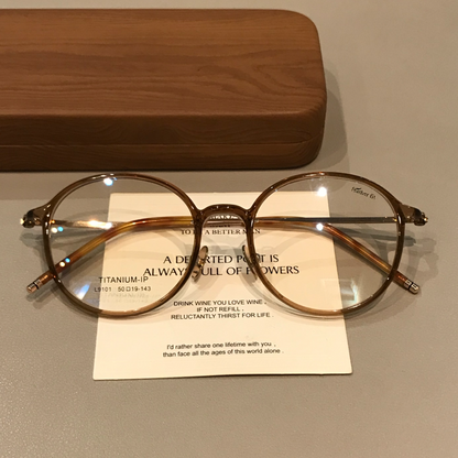 
Monturas de gafas redondas con a ros finos, gris transparente o marrón té frío - Imagen 8