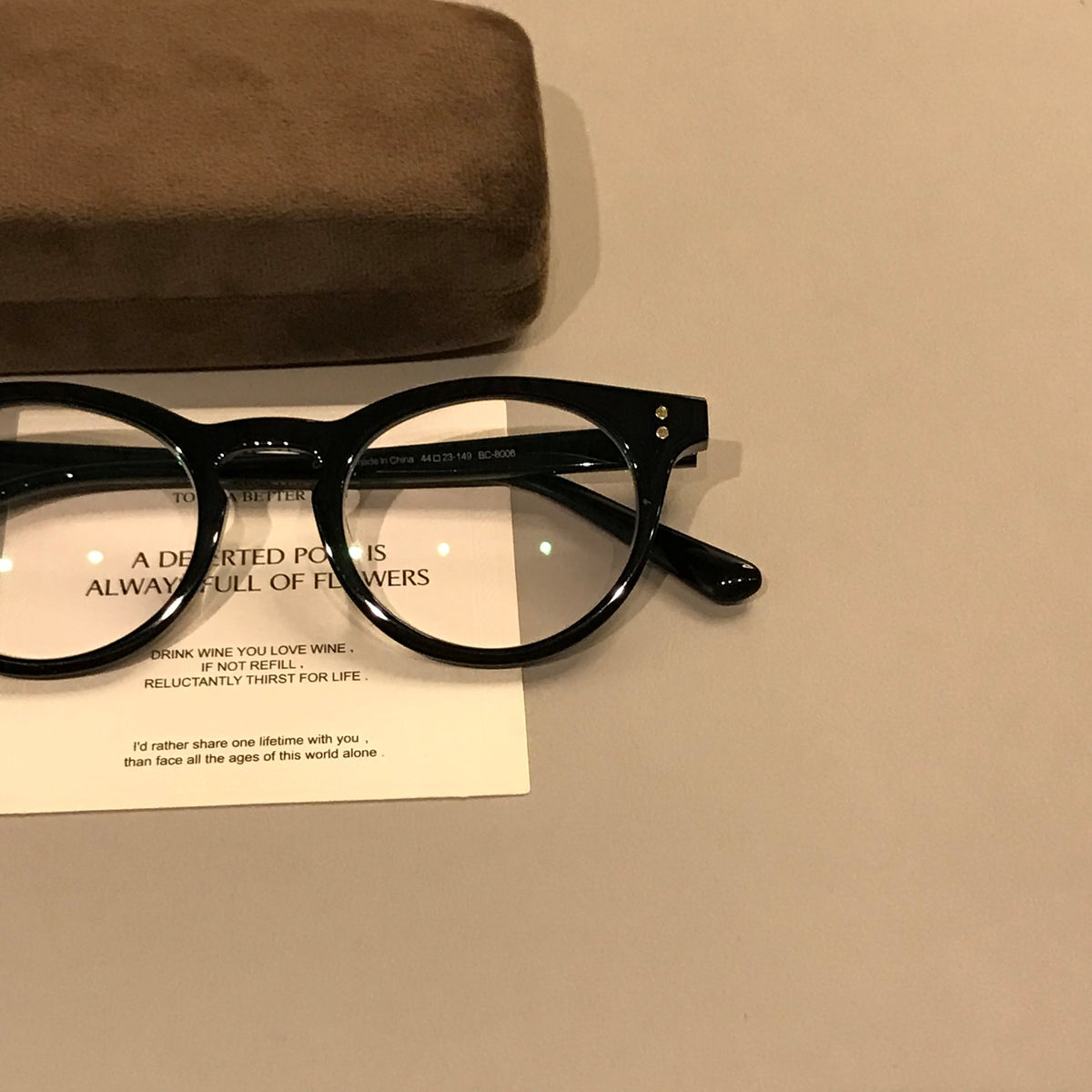 
Monturas de gafas ovaladas compactas con aros gruesos, negro o carey - Imagen 6