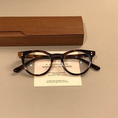 
Monturas de gafas ovaladas compactas con aros gruesos, negro o carey - Imagen 8